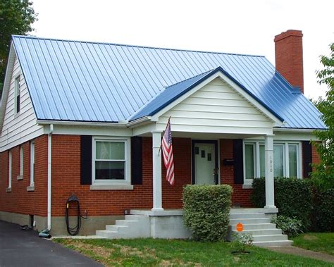 brick house with blue metal roof|homes with brown metal roofs.